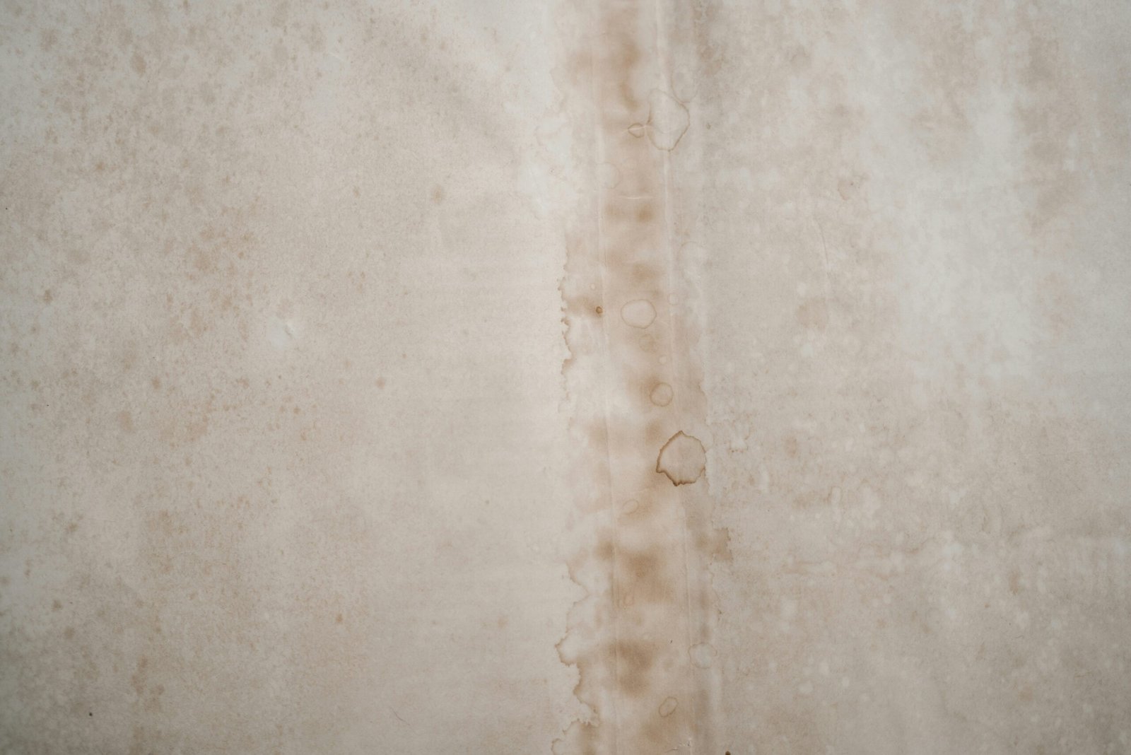 Water damage stain on an interior wall from a hidden leak, Aurora, CO